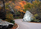 Vermont Fall Colors and Road Winding Around Bouldersd